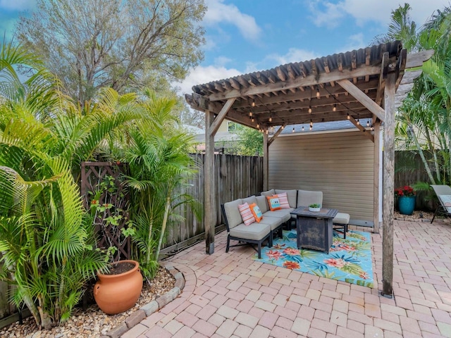 view of patio / terrace with an outdoor living space and a pergola