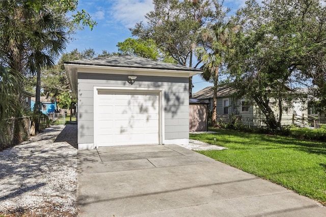 garage with a yard