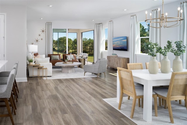 dining room featuring a chandelier and hardwood / wood-style flooring