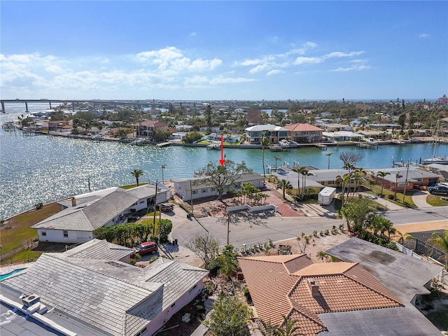 drone / aerial view featuring a water view