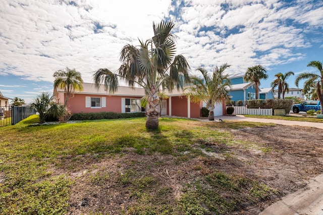 ranch-style house with a front yard