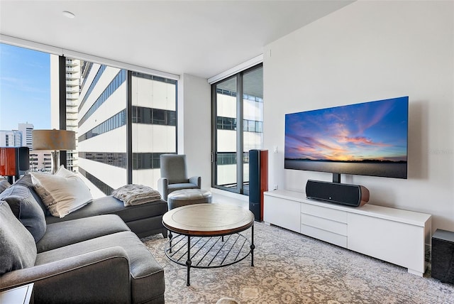 living room featuring carpet and expansive windows