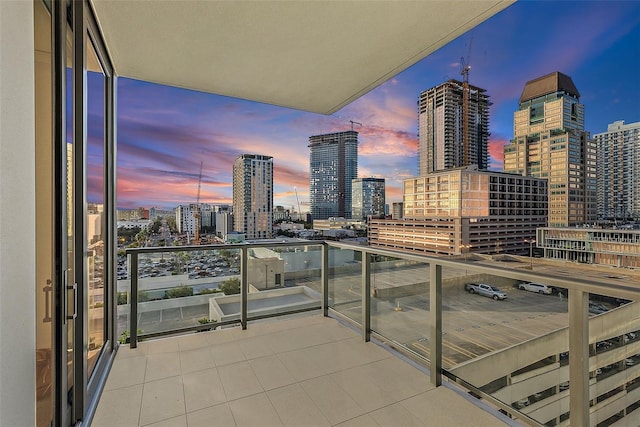 view of balcony at dusk