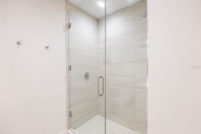 bathroom with an enclosed shower