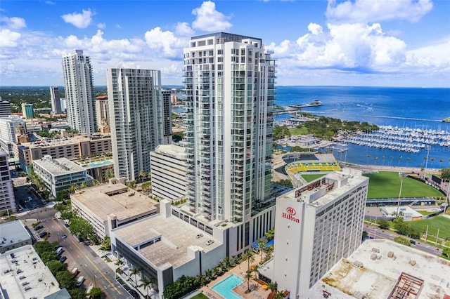 birds eye view of property with a water view