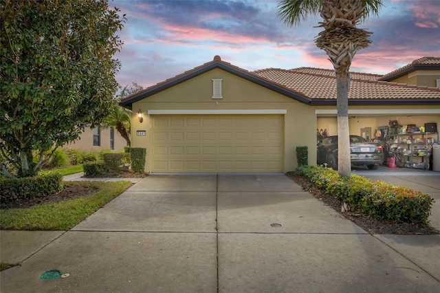 view of front of property featuring a garage