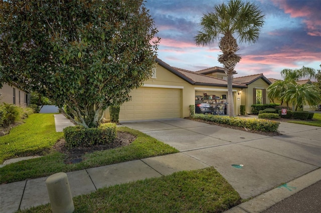 view of front of home with a garage