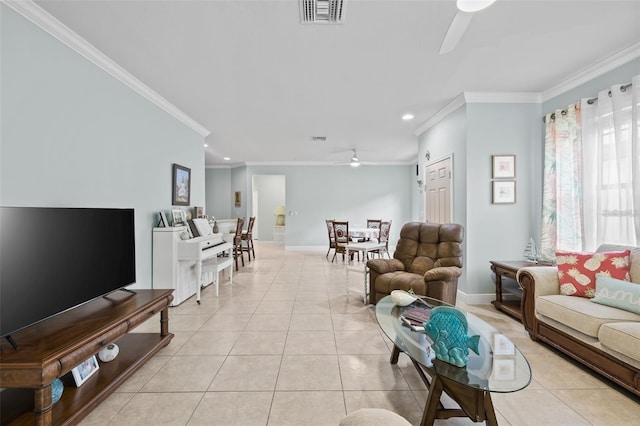 tiled living room featuring crown molding and ceiling fan