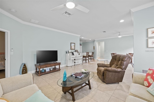 tiled living room featuring ceiling fan and crown molding