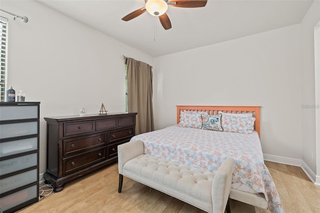 bedroom featuring light hardwood / wood-style floors and ceiling fan