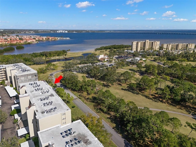 birds eye view of property with a water view