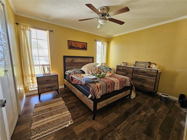 bedroom featuring ceiling fan, crown molding, dark wood-type flooring, and a textured ceiling