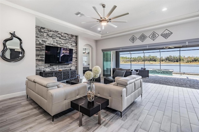 living room featuring ceiling fan and light hardwood / wood-style flooring