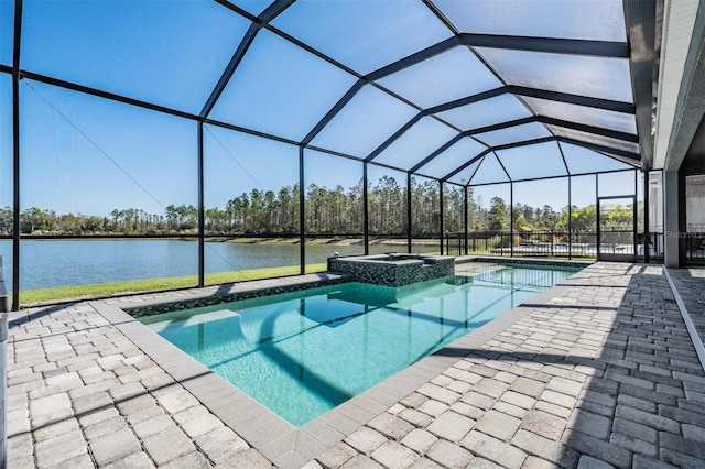 view of swimming pool with a lanai, a patio area, a water view, and an in ground hot tub