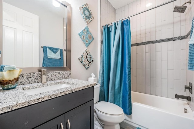 full bathroom with toilet, vanity, and shower / tub combo with curtain