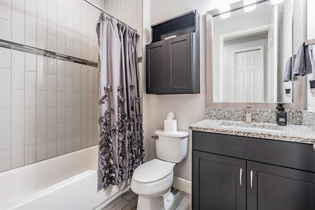 full bathroom with toilet, vanity, shower / bath combo, and hardwood / wood-style flooring