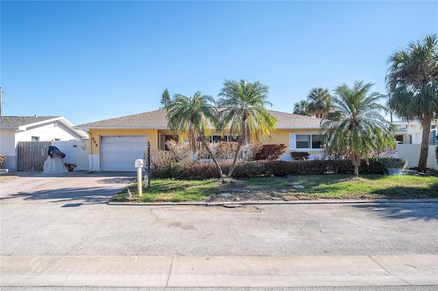 single story home with a garage