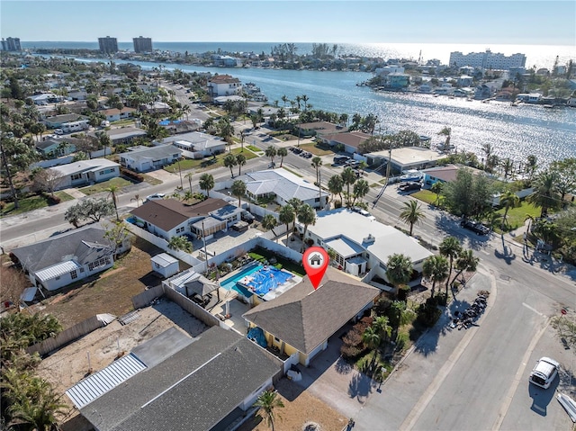 birds eye view of property featuring a water view