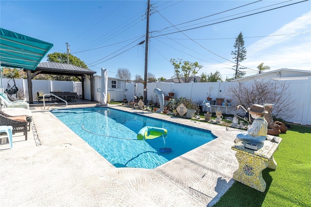 view of pool featuring a gazebo and a patio area