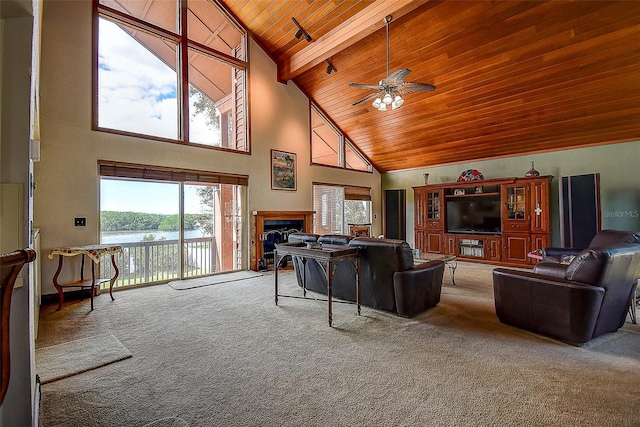 living room featuring carpet flooring, high vaulted ceiling, ceiling fan, and wooden ceiling