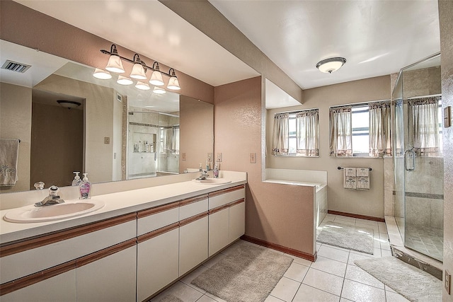 bathroom featuring tile patterned floors, vanity, and walk in shower