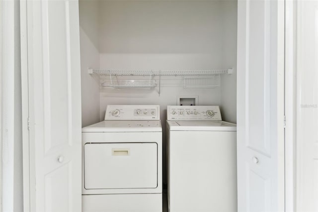 laundry room featuring washing machine and dryer