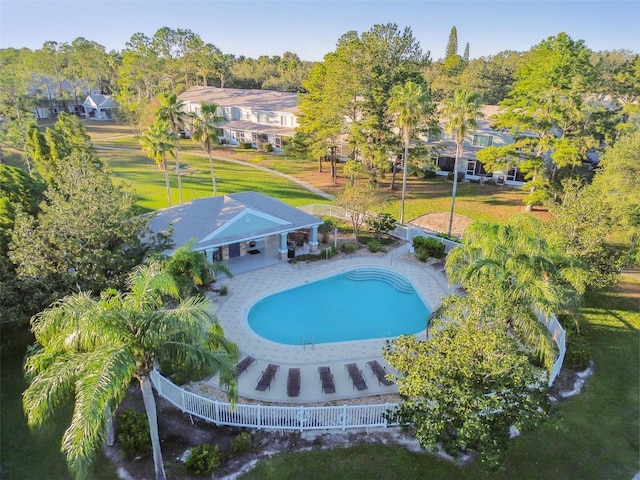 view of pool featuring a yard and a patio