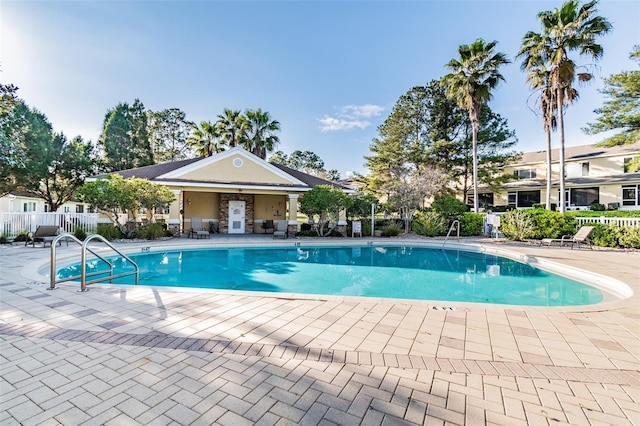 view of swimming pool with a patio