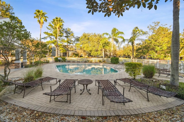 view of swimming pool featuring a patio