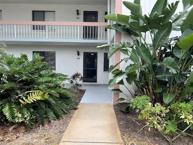 doorway to property with a balcony