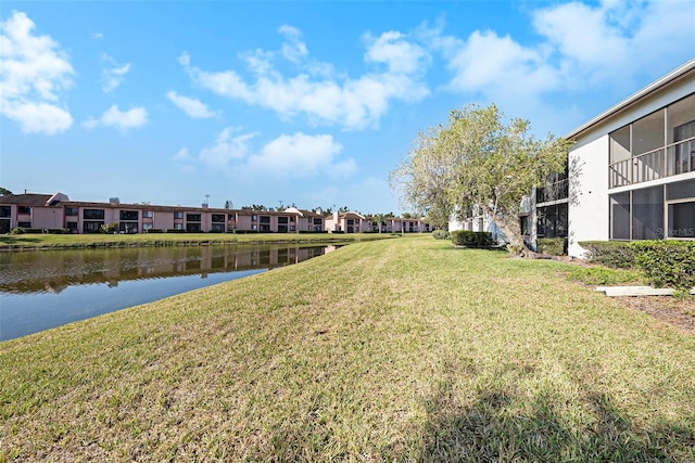 view of yard with a water view