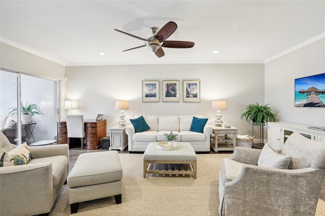 living room featuring ceiling fan, ornamental molding, and light hardwood / wood-style flooring