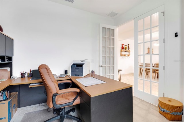 office featuring a healthy amount of sunlight and french doors