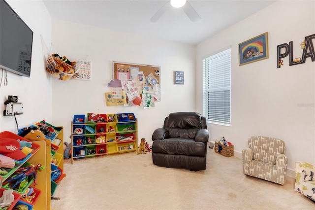 game room featuring ceiling fan and carpet