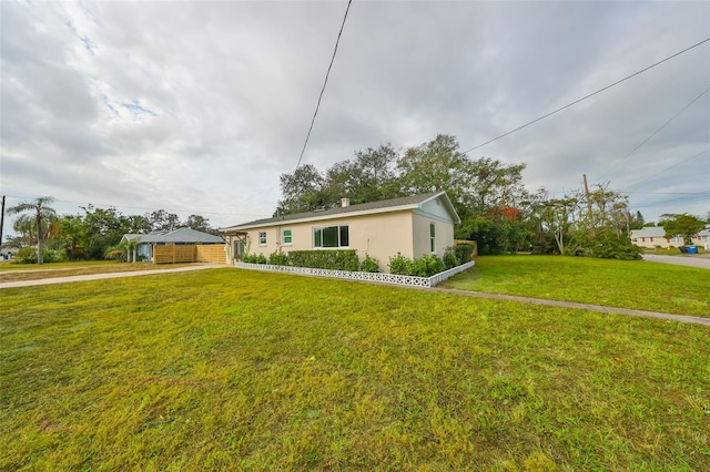 single story home featuring a front yard