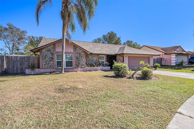 ranch-style home with a garage and a front yard