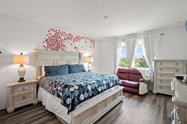 bedroom featuring dark hardwood / wood-style flooring