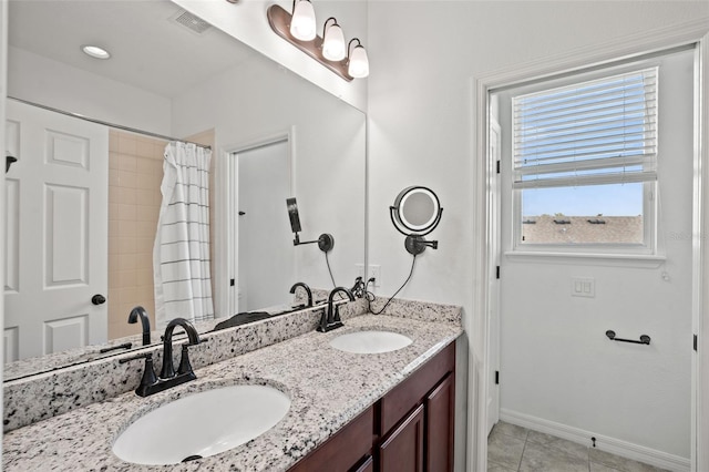 bathroom with tile patterned flooring, vanity, and a shower with shower curtain