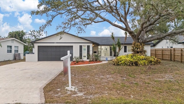 ranch-style home with a garage