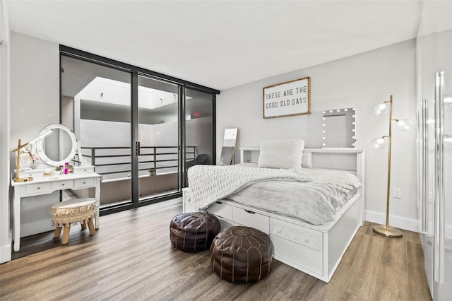 bedroom featuring hardwood / wood-style floors