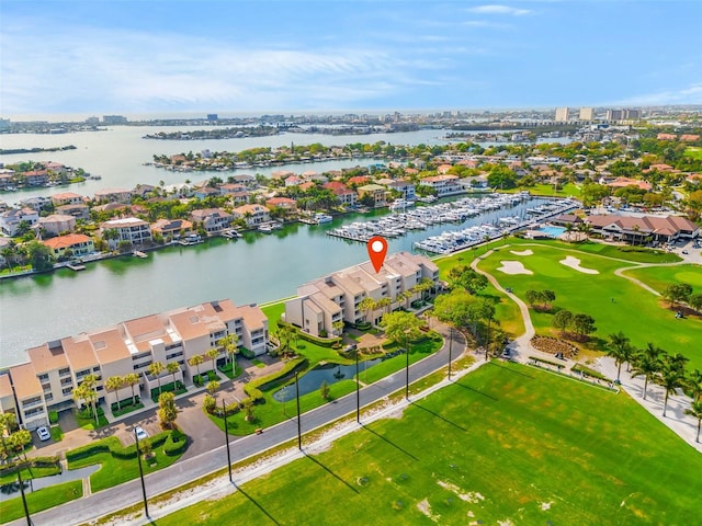 birds eye view of property featuring a water view