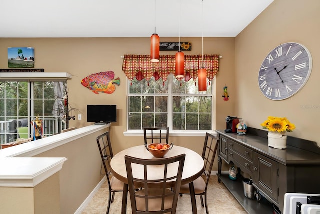 dining room with light tile patterned floors