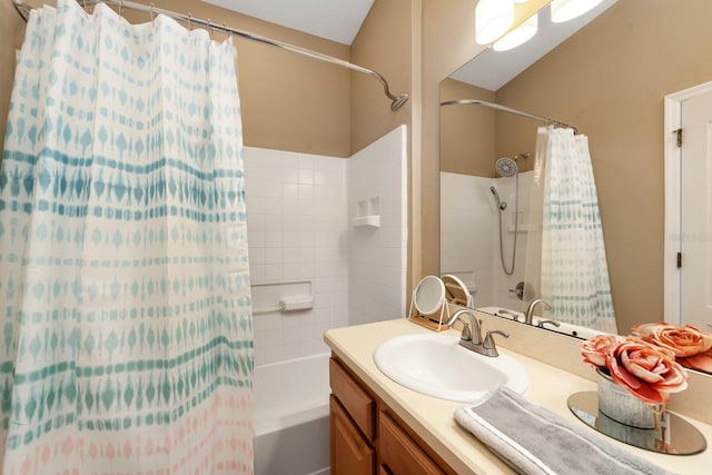 bathroom with vanity and shower / bathtub combination with curtain