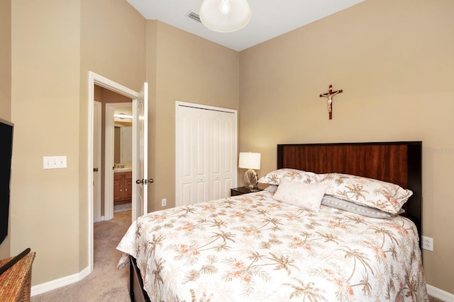 carpeted bedroom featuring a closet