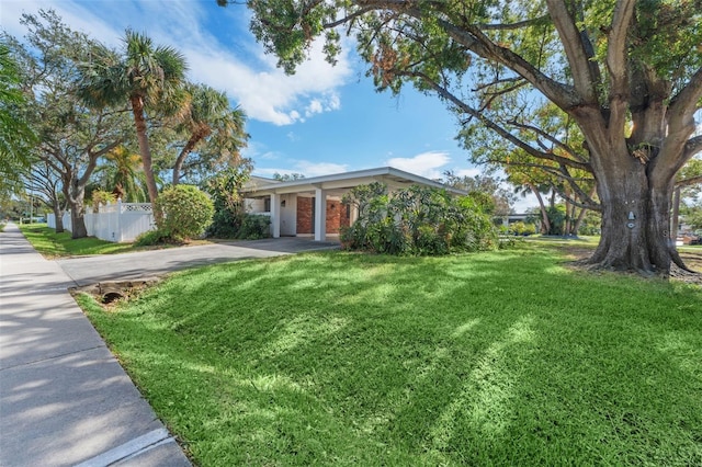 view of front of home with a front yard