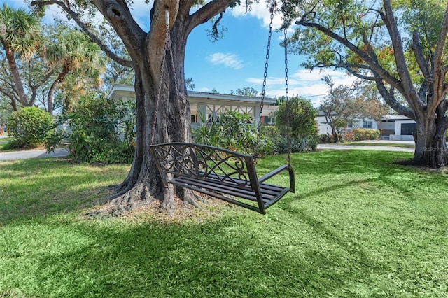 view of home's community featuring a yard