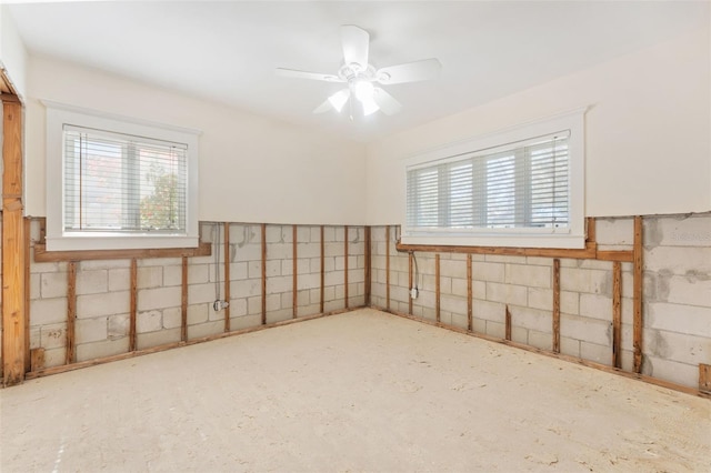 unfurnished room featuring ceiling fan