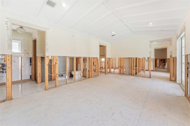 misc room with lofted ceiling and a wealth of natural light