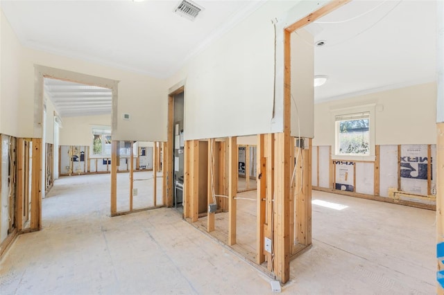 hallway featuring ornamental molding