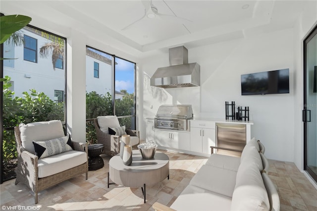 living room with ceiling fan